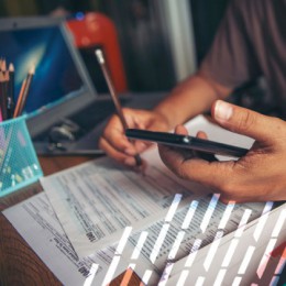 Image of a person filing taxes